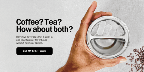 Hand holding a Splitflask hot and cold tumbler with straw